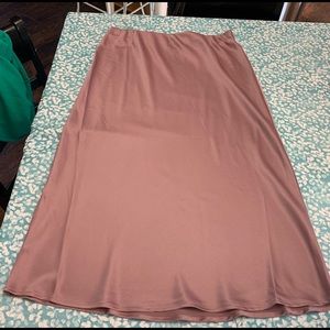 A New Day Size L. Mid Rise, Slip skirt pull on. 100 % polyester.